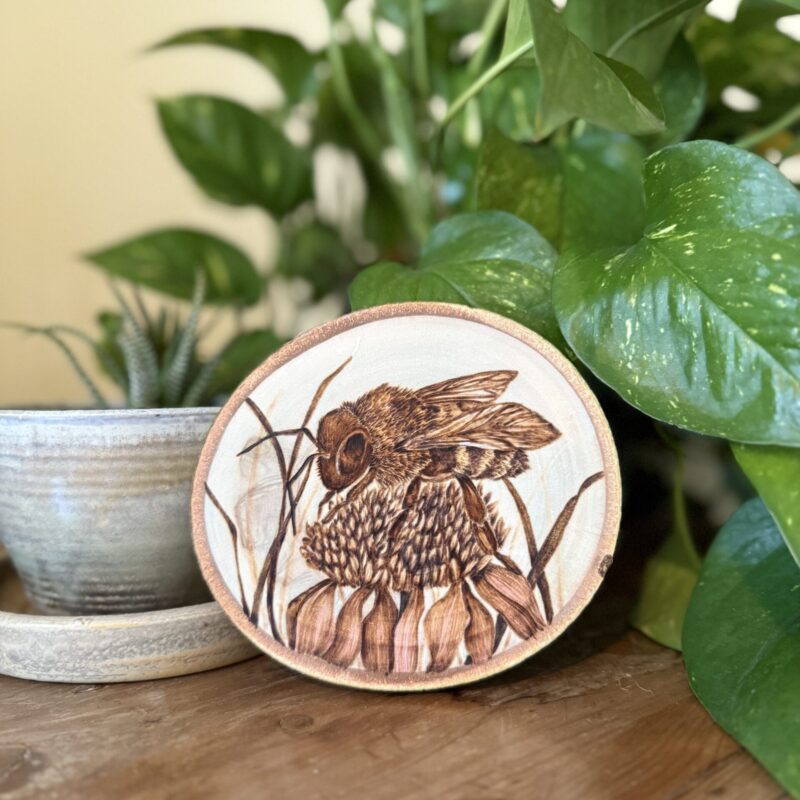 woodburned bee on flower